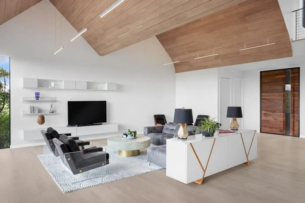 Barton Hills Residence living room with vaulted wood ceiling and white built-ins