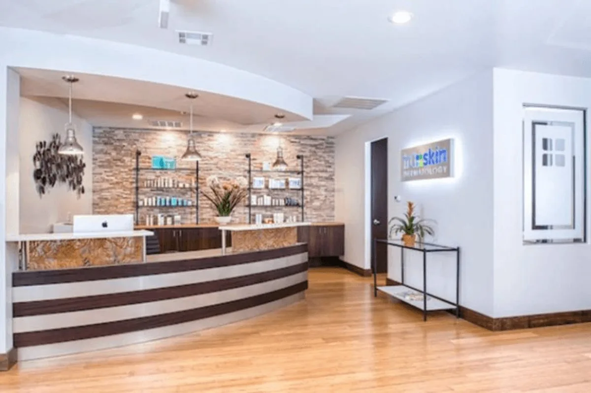 Reception area of the Tru Skin Dermatology office designed by Spaces Designed